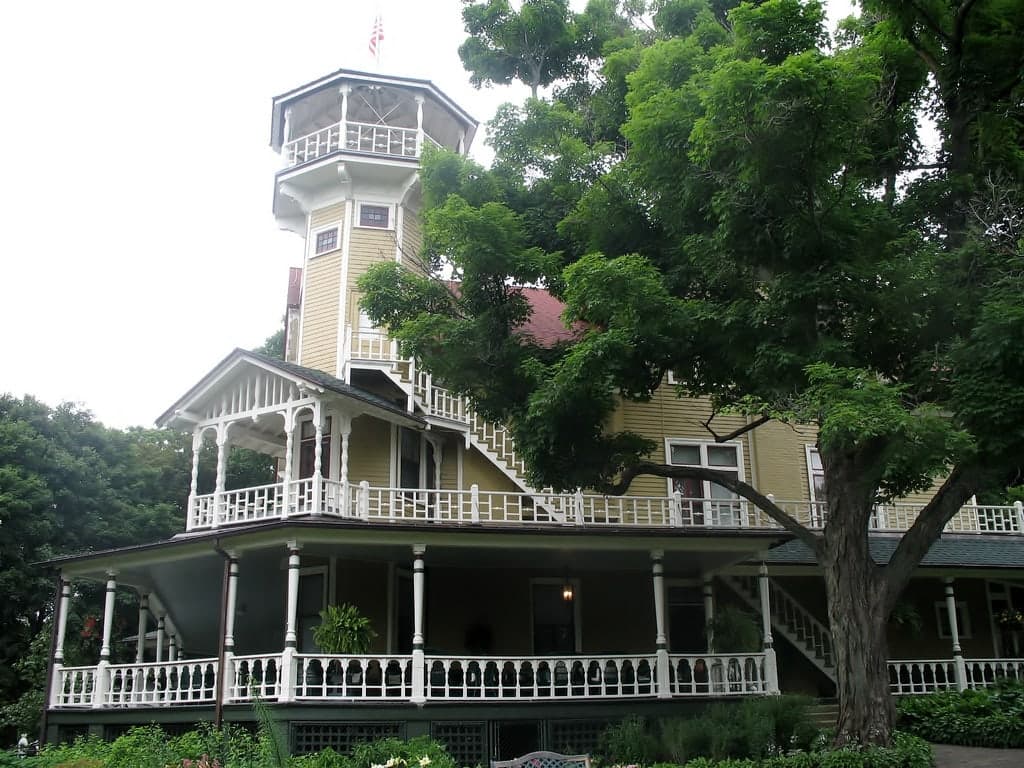 Black Point Estate and its distinctive observation tower among mature trees