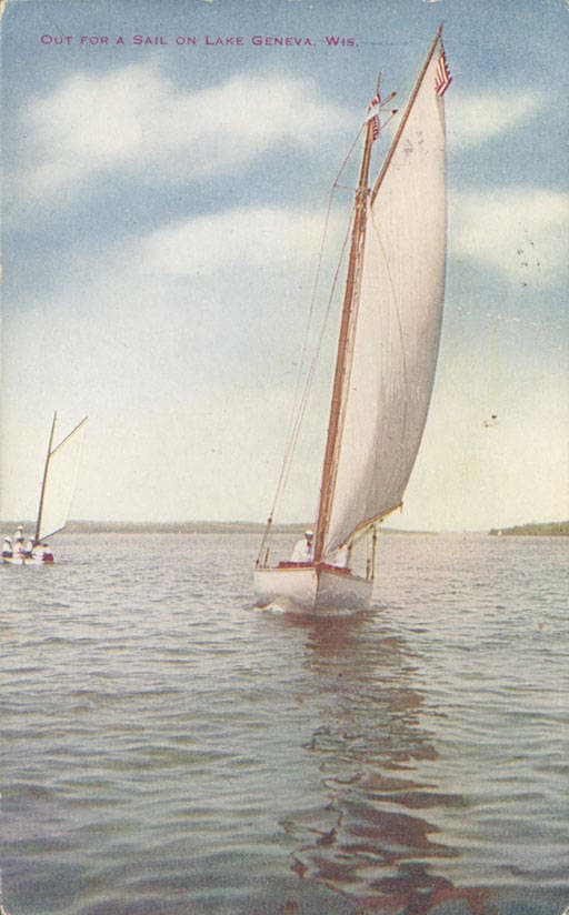 A historic postcard of a sailboat underway on Geneva Lake