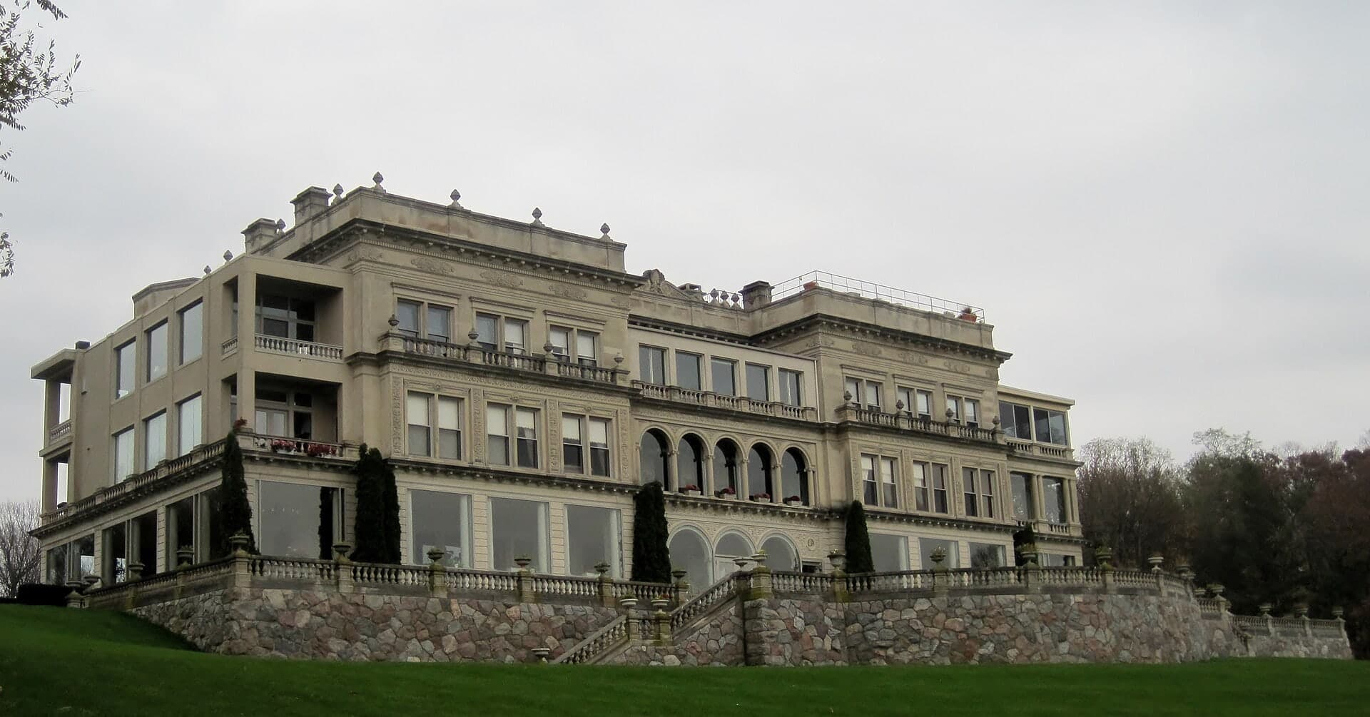 Stone Manor rising above the Geneva Lake shoreline